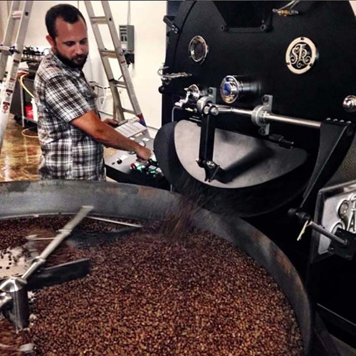 operator with 35kg coffee roaster